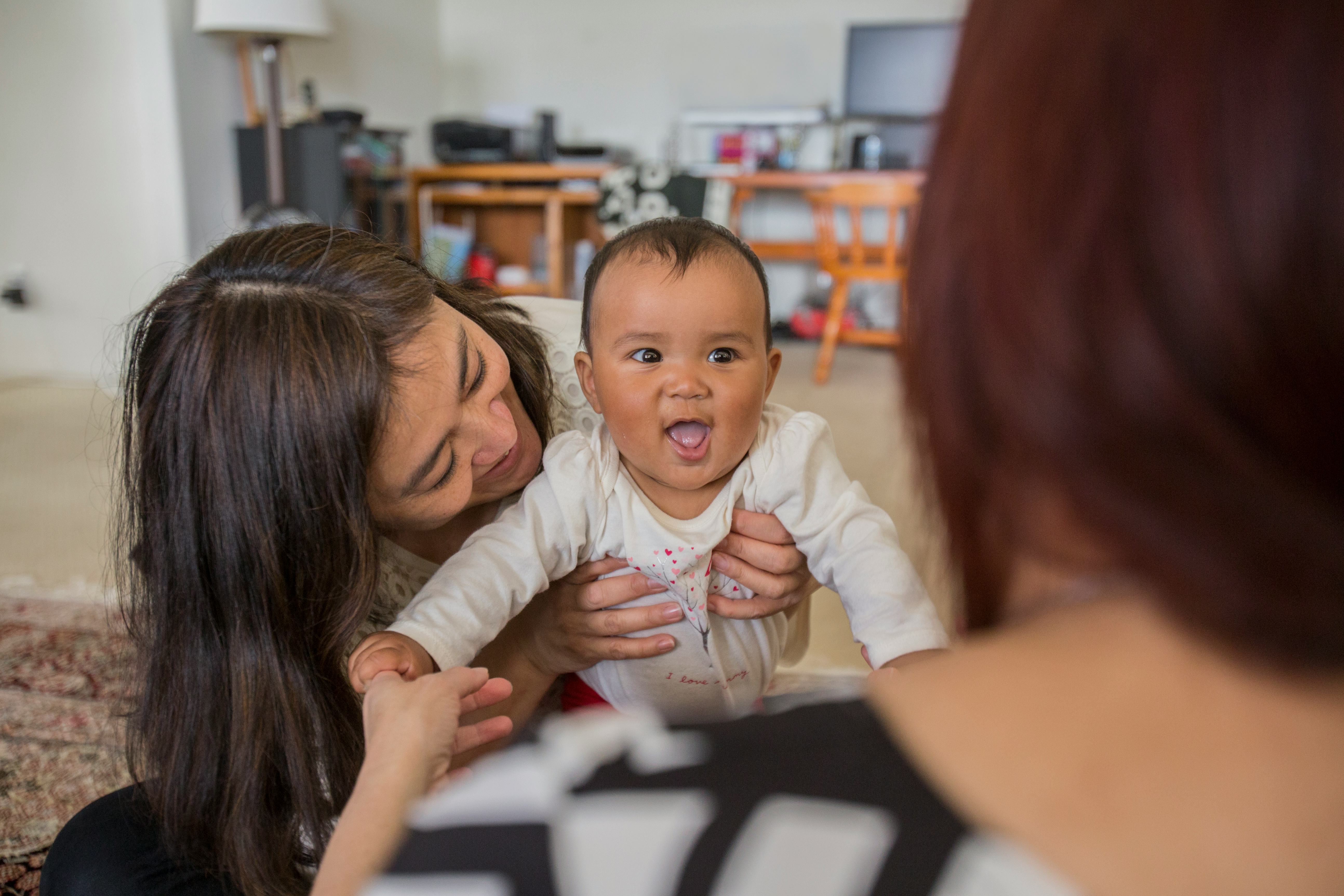 Babies may be fearful of strangers as early as 4 months old, according to experts.