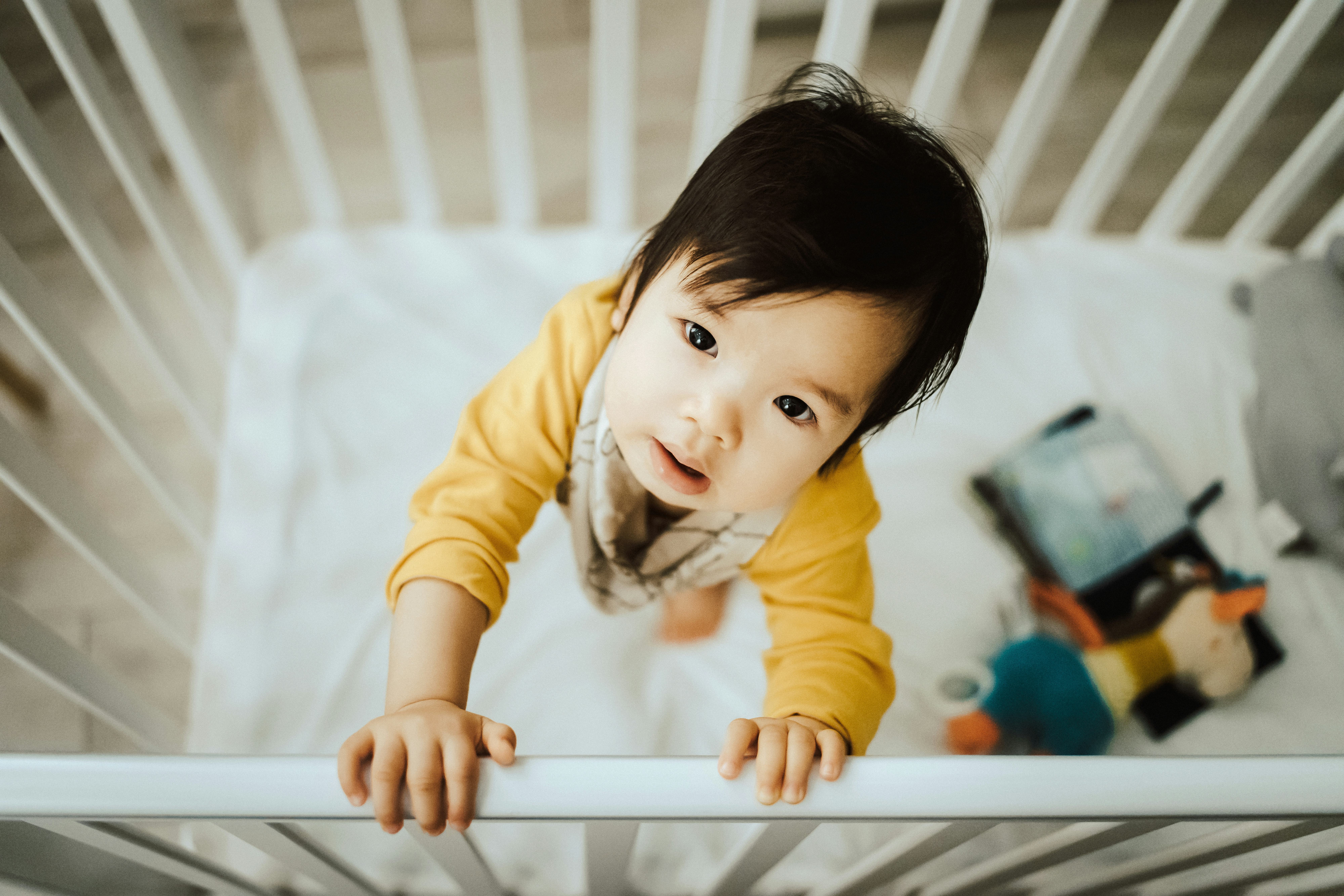 11 Ways To Keep Your Toddler From Climbing Out Of The Crib