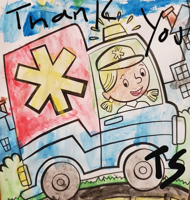 A coloring book picture of a person driving an ambulance, painted with watercolors.